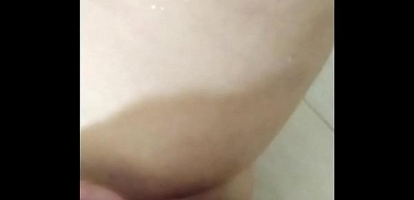  Amazing stepdaughter masturbating while taking a shower